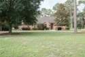 Nestled on the tee box of the 8th hole at the renowned Pine for sale in Jesup Georgia Wayne County County on GolfHomes.com