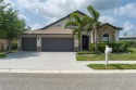 Just in time for the new school year! This spacious 4-bedroom for sale in Palmetto Florida Manatee County County on GolfHomes.com