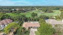 Situated on a nearly half-acre, fully fenced lot in a quiet for sale in Boynton Beach Florida Palm Beach County County on GolfHomes.com