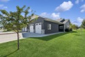 Experience easy living in this beautifully designed single-level for sale in Kalispell Montana Flathead County County on GolfHomes.com