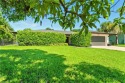Nestled in an up-and-coming neighborhood backing up to a for sale in Naples Florida Collier County County on GolfHomes.com
