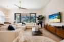 THIS HOME HAS IT ALL! New roof, flood barriers, hurricane impact for sale in Estero Florida Lee County County on GolfHomes.com