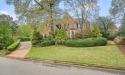 An exceptional lifestyle comes with this stunning brick beauty for sale in Roswell Georgia Fulton County County on GolfHomes.com
