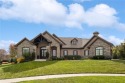 Located on a huge private, extensively landscaped, cul-de-sac for sale in Leawood Kansas Johnson County County on GolfHomes.com