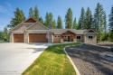 Modern Craftsman-style home offering 1,993 sq ft of single-level for sale in Blanchard Idaho Bonner County County on GolfHomes.com