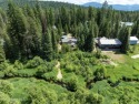 100 feet of Lamb Creek frontage in a peaceful, private setting for sale in Priest Lake Idaho Bonner County County on GolfHomes.com