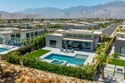Located within the highly sought-after, guard-gated Escena for sale in Palm Springs California Riverside County County on GolfHomes.com