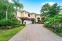 Light and bright pool home nestled in the golf and beach club of for sale in Palm Beach Gardens Florida Palm Beach County County on GolfHomes.com