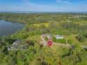 Discover your slice of paradise on this expansive waterfront for sale in Cape Charles Virginia Northampton County County on GolfHomes.com