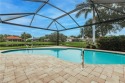 WELCOME HOME to Longshore Lake's most exquisite 4-Bedroom, 3 for sale in Naples Florida Collier County County on GolfHomes.com