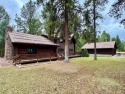This Rocky Mountain Log Home has it all! Great value with this 2 for sale in Seeley Lake Montana Missoula County County on GolfHomes.com