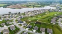 SHOW STOPPER IN EDGEWATER AT CREEKMORE BACKING TO THE 16th HOLE for sale in Raymore Missouri Cass County County on GolfHomes.com