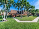 Located in a stunning golf course community with a friendly for sale in Davie Florida Broward County County on GolfHomes.com