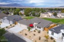 Backing up to the tee green at Hole #2 of The Desert Lakes Golf for sale in Fernley Nevada Lyon County County on GolfHomes.com
