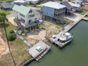 Charming Waterfront Oasis with Breathtaking Sunrises  Sunsets for sale in Dauphin Island Alabama Mobile County County on GolfHomes.com