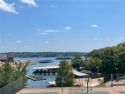 Discover luxury resort living at it's finest in this lake view for sale in Lake Ozark Missouri Camden County County on GolfHomes.com