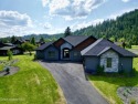 GOLF MEMBERSHIP INCLUDED! Discover the pinnacle of North Idaho for sale in Sandpoint Idaho Bonner County County on GolfHomes.com