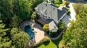 Gorgeous Hard Coat Stucco Executive Home with a HEATED SALT for sale in Alpharetta Georgia Fulton County County on GolfHomes.com