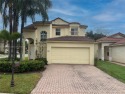 Discover the comfort of this charming 4-bedroom, 2.5-bathroom for sale in Pembroke Pines Florida Broward County County on GolfHomes.com