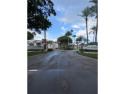 First-floor 3BR/2BA condo w/ new AC  roof in Las Verdes at Grand for sale in Pembroke Pines Florida Broward County County on GolfHomes.com
