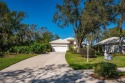 This home is on a spectacular Lot totally private with lake and for sale in University Park Florida Manatee County County on GolfHomes.com