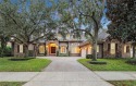 Nestled on an unparalleled lot within the exclusive, guard-gated for sale in Windermere Florida Orange County County on GolfHomes.com