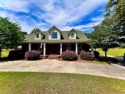 Beautiful Brick Home on the Golf Course with inground swimming for sale in Manning South Carolina Clarendon County County on GolfHomes.com