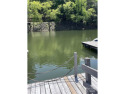 Live the Lake Wylie lifestyle in this beautifully updated 3BR/2 for sale in Fort Mill South Carolina York County County on GolfHomes.com