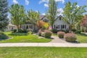 A beautiful French Normandy style former Parade Home that backs for sale in Eagle Idaho Ada County County on GolfHomes.com