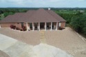 72 rounds of golf per year and use of the two pools, marina for sale in Graford Texas Palo Pinto County County on GolfHomes.com