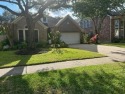 Lovely single-story home in a gated community located on Willow for sale in Katy Texas Fort Bend County County on GolfHomes.com