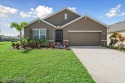 Welcome to this charming 4-bedroom, 2-bath home situated on a for sale in Melbourne Florida Brevard County County on GolfHomes.com