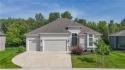 This BEAUTIFUL HOME backs to and walks out to a fully treed for sale in Basehor Kansas Leavenworth County County on GolfHomes.com