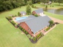 This 2936 heated sq ft property on 5.19 acres is a dream come for sale in Adamsville Tennessee Hardin County County on GolfHomes.com