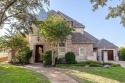 Absolutely breath-taking Darling home on spacious corner lot for sale in Lewisville Texas Denton County County on GolfHomes.com