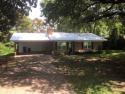 New metal roof, new windows, new covered deck and more.  This for sale in Saint Joseph Louisiana Tensas Parish County on GolfHomes.com