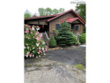 Welcome to this beautifully updated year-round home in Linville for sale in Newland North Carolina Avery County County on GolfHomes.com
