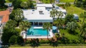 Simply stunning and spacious, custom home situated on a double for sale in Panama City Beach Florida Bay County County on GolfHomes.com