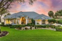 ESTATE HOME w/ IMMEDIATE GOLF AVAILABLE ON SIGNATURE HOLE IN THE for sale in Estero Florida Lee County County on GolfHomes.com
