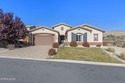 PRESENTING A UNIQUELY LOCATED SOMERSETT LUXURY RESIDENCE! If for sale in Reno Nevada Washoe County County on GolfHomes.com