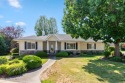 Impeccably maintained single-level home in the desirable for sale in Post Falls Idaho Kootenai County County on GolfHomes.com