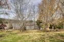 ONE OF THE LAST AVAILABLE gently-sloped LAKEFRONT LOTS left in for sale in Vonore Tennessee Loudon County County on GolfHomes.com