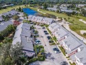 Enjoy the easy life in this first floor unit, mere steps away for sale in Jupiter Florida Palm Beach County County on GolfHomes.com