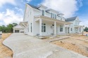 This new home built by Cole Construction is the popular Rose for sale in Watersound Beach Florida Walton County County on GolfHomes.com