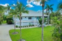 Gulf Access Waterfront Retreat on Sanibel Island - Coastal for sale in Sanibel Florida Lee County County on GolfHomes.com