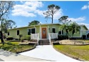 This lovely 2 bedroom/2bath + Family room home with enclosed for sale in N. Fort Myers Florida Lee County County on GolfHomes.com