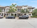 Located in the vibrant heart of Downtown Doral, this three-story for sale in Doral Florida Miami-Dade County County on GolfHomes.com