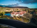 Step into timeless elegance with this stunning former Parade for sale in Saint George Utah Washington County County on GolfHomes.com