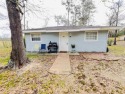 This beautiful cottage is located in Wildwood at the end of a for sale in Village Mills Texas Hardin County County on GolfHomes.com