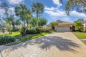 Experience the best of country club living in this beautifully for sale in Palm Beach Gardens Florida Palm Beach County County on GolfHomes.com